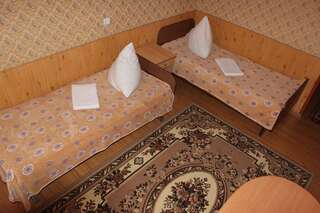 Гостиница Сосновый бор Курск Односпальная кровать в двухместном номере с 2 отдельными кроватями-1