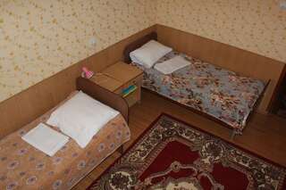 Гостиница Сосновый бор Курск Односпальная кровать в двухместном номере с 2 отдельными кроватями-4